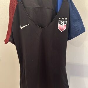 Nike Black Soccer Jersey with Red and Blue Accents